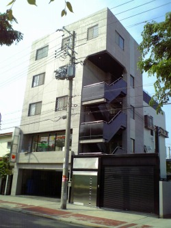 塗装施工後コンクリート調の外壁塗装